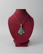 Dije Trinidad floral de turquesa con Malaquita